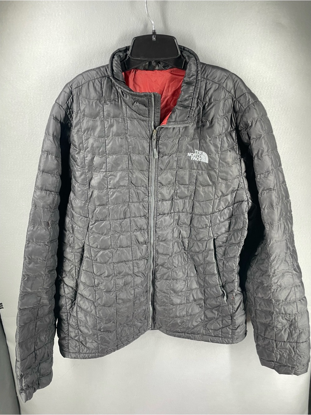 The North Face Black Quilted Jacket with Red Interior